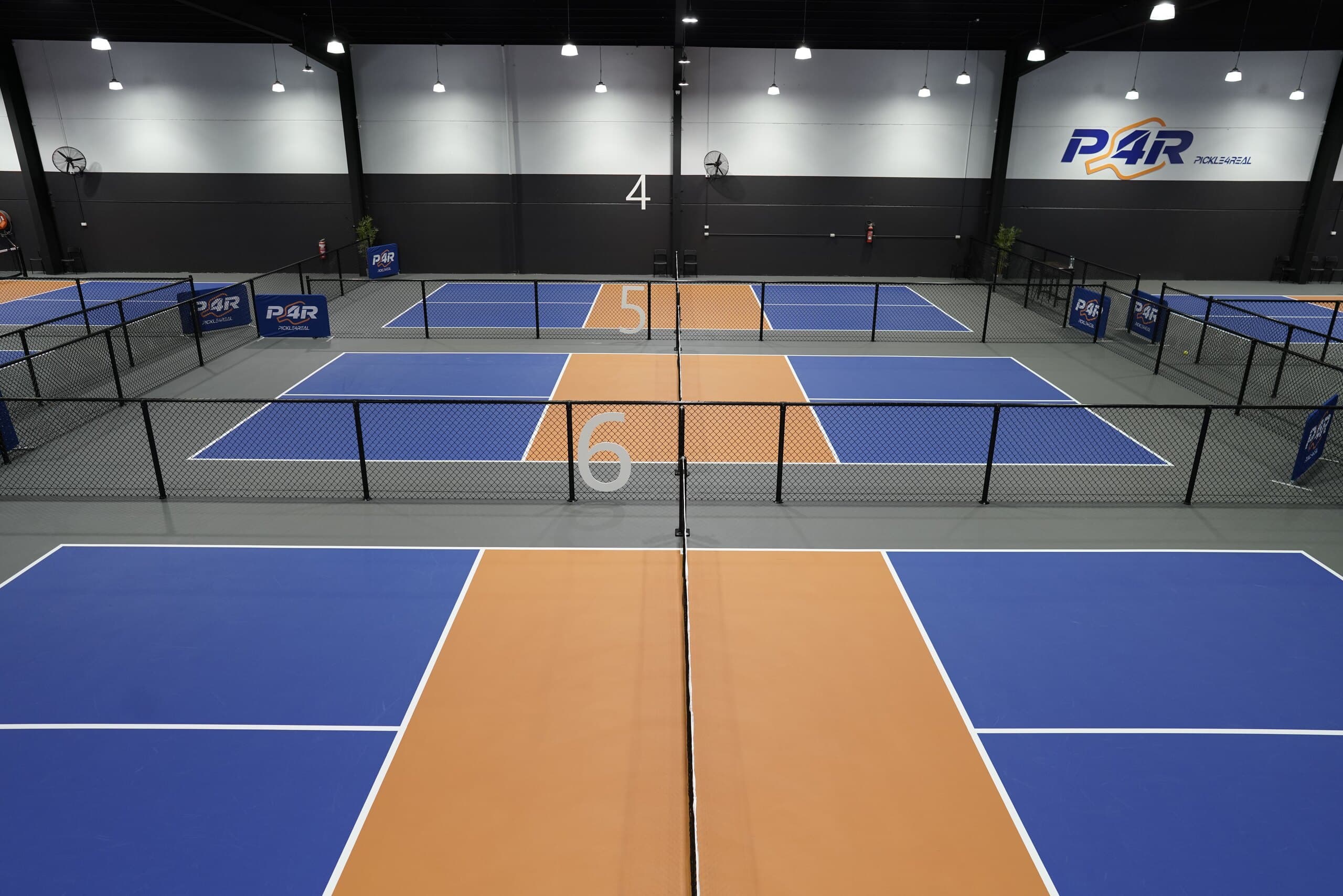Rows of indoor pickleball courts at Pickle4Real Mentone
