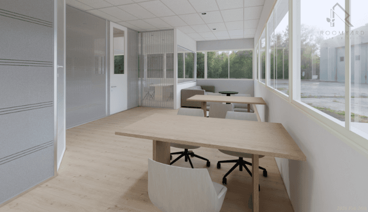 Pickle4Real meeting room with shared boardroom table, ergonomic chairs, and natural light